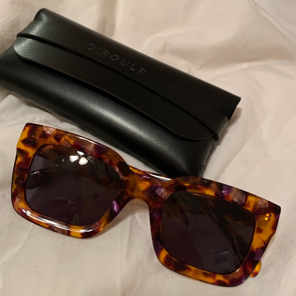 Brand new never worn circulr sunglasses